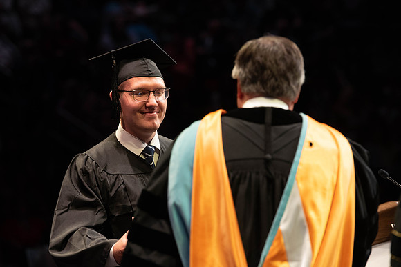 Students graduate from College of Physical Sciences and Engineering. Convocation held in the Hart Building Auditorium.