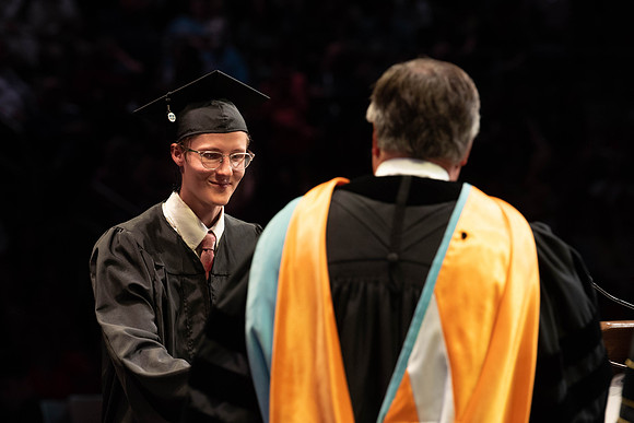 Students graduate from College of Physical Sciences and Engineering. Convocation held in the Hart Building Auditorium.