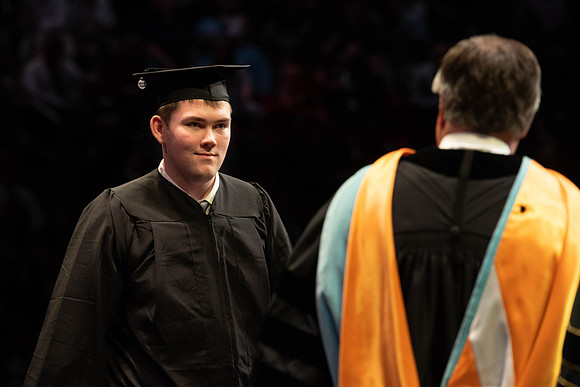Students graduate from College of Physical Sciences and Engineering. Convocation held in the Hart Building Auditorium.
