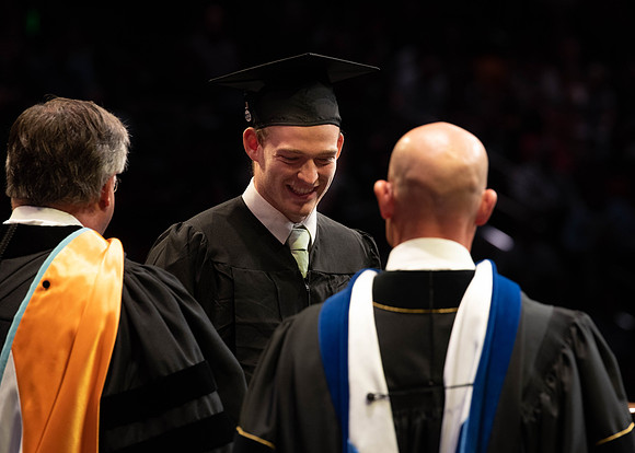 Students graduate from College of Physical Sciences and Engineering. Convocation held in the Hart Building Auditorium.