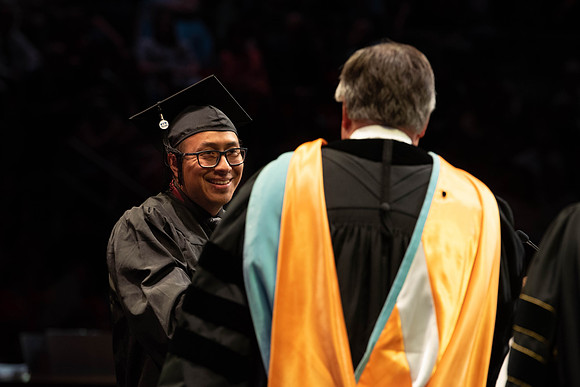 Students graduate from College of Physical Sciences and Engineering. Convocation held in the Hart Building Auditorium.