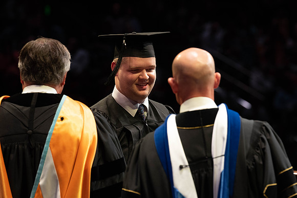 Students graduate from College of Physical Sciences and Engineering. Convocation held in the Hart Building Auditorium.