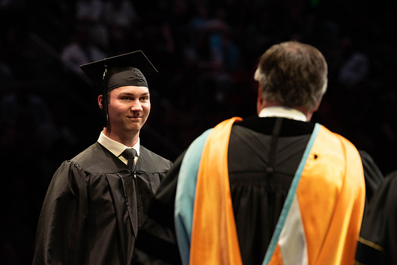 Students graduate from College of Physical Sciences and Engineering. Convocation held in the Hart Building Auditorium.