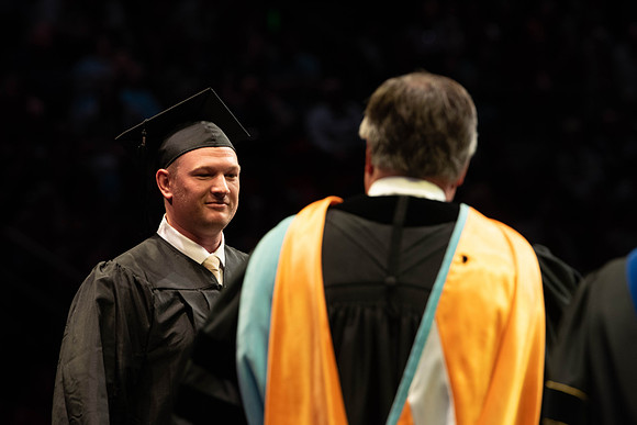 Students graduate from College of Physical Sciences and Engineering. Convocation held in the Hart Building Auditorium.