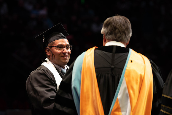 Students graduate from College of Physical Sciences and Engineering. Convocation held in the Hart Building Auditorium.