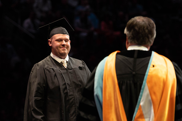 Students graduate from College of Physical Sciences and Engineering. Convocation held in the Hart Building Auditorium.