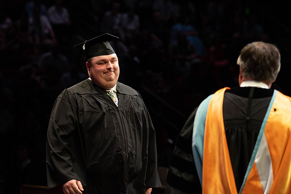Students graduate from College of Physical Sciences and Engineering. Convocation held in the Hart Building Auditorium.
