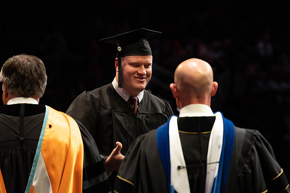 Students graduate from College of Physical Sciences and Engineering. Convocation held in the Hart Building Auditorium.
