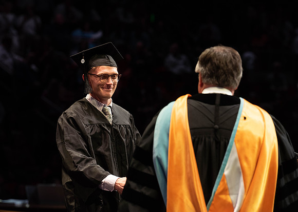 Students graduate from College of Physical Sciences and Engineering. Convocation held in the Hart Building Auditorium.