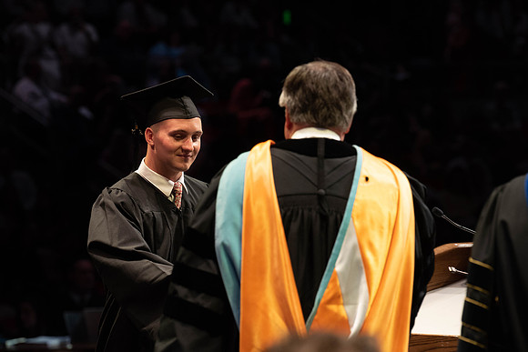 Students graduate from College of Physical Sciences and Engineering. Convocation held in the Hart Building Auditorium.