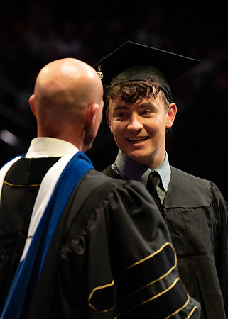 Students graduate from College of Physical Sciences and Engineering. Convocation held in the Hart Building Auditorium.