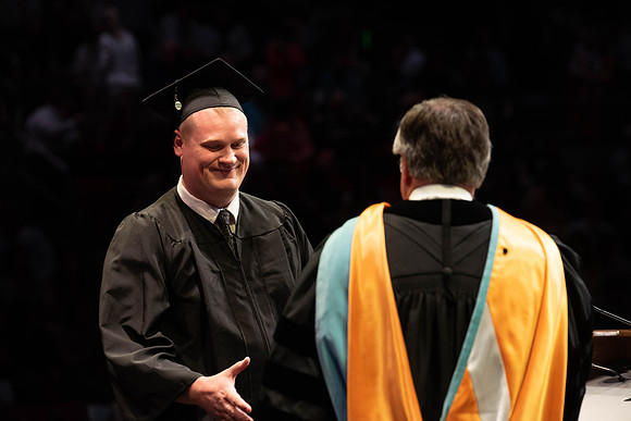 Students graduate from College of Physical Sciences and Engineering. Convocation held in the Hart Building Auditorium.