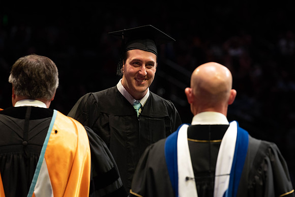Students graduate from College of Physical Sciences and Engineering. Convocation held in the Hart Building Auditorium.