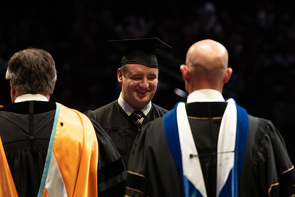 Students graduate from College of Physical Sciences and Engineering. Convocation held in the Hart Building Auditorium.