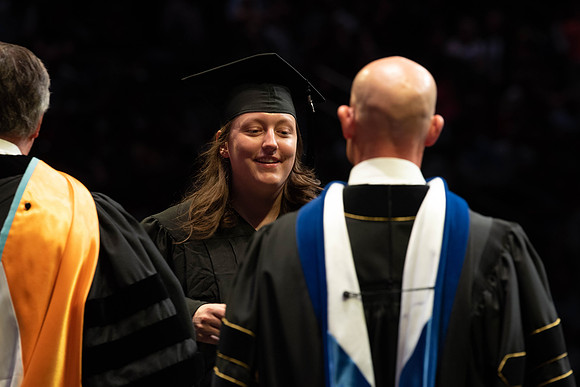 Students graduate from College of Physical Sciences and Engineering. Convocation held in the Hart Building Auditorium.