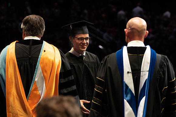 Students graduate from College of Physical Sciences and Engineering. Convocation held in the Hart Building Auditorium.