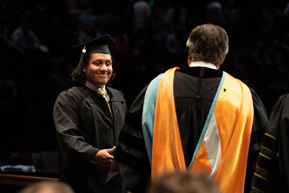 Students graduate from College of Physical Sciences and Engineering. Convocation held in the Hart Building Auditorium.