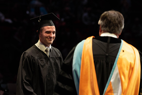 Students graduate from College of Physical Sciences and Engineering. Convocation held in the Hart Building Auditorium.