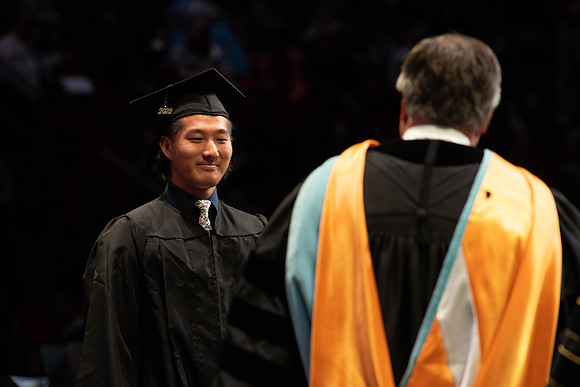 Students graduate from College of Physical Sciences and Engineering. Convocation held in the Hart Building Auditorium.