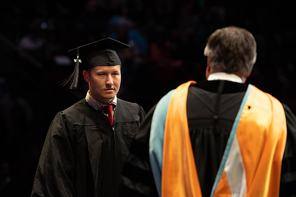 Students graduate from College of Physical Sciences and Engineering. Convocation held in the Hart Building Auditorium.