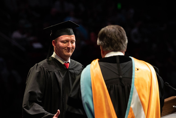 Students graduate from College of Physical Sciences and Engineering. Convocation held in the Hart Building Auditorium.