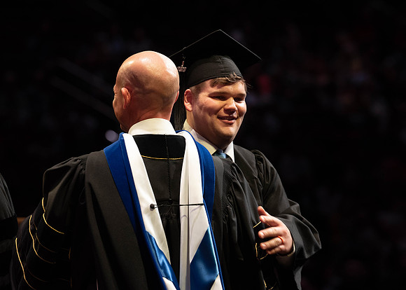 Students graduate from College of Physical Sciences and Engineering. Convocation held in the Hart Building Auditorium.