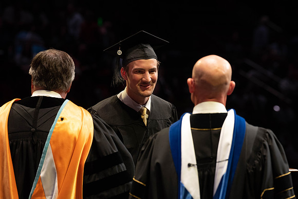 Students graduate from College of Physical Sciences and Engineering. Convocation held in the Hart Building Auditorium.
