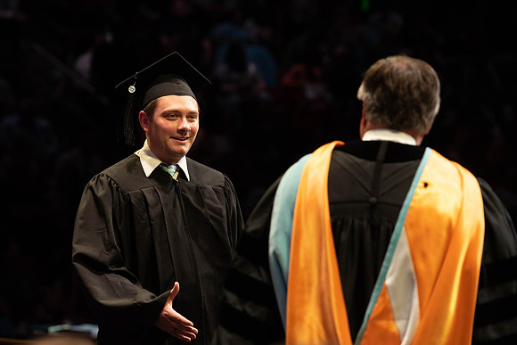 Students graduate from College of Physical Sciences and Engineering. Convocation held in the Hart Building Auditorium.
