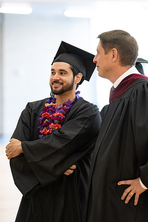Graduates around campus.