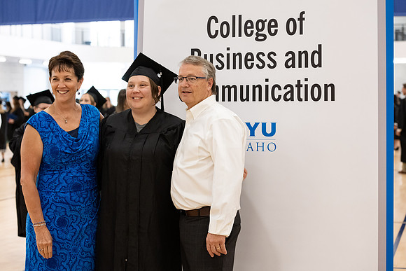 Graduates around campus.