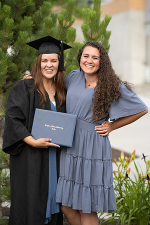 Graduates around campus.