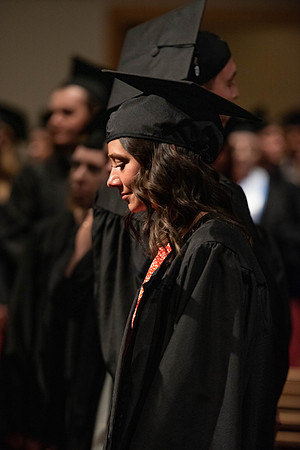 Students during commencement, walking.
