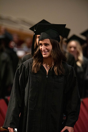 Students during commencement, walking.