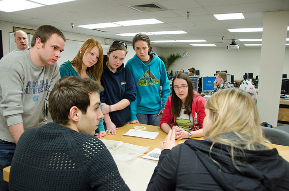 College horticulture class works with high school students to redesign the Clark playground facilities.