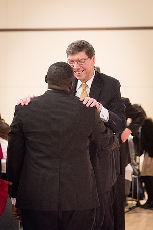 Faculty enjoy a luncheon with Clayton Christensen, the Kim B. Clark Professor of Business Administration at the Harvard Business School