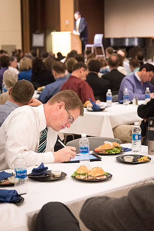 Faculty enjoy a luncheon with Clayton Christensen, the Kim B. Clark Professor of Business Administration at the Harvard Business School