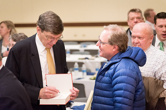 Faculty enjoy a luncheon with Clayton Christensen, the Kim B. Clark Professor of Business Administration at the Harvard Business School