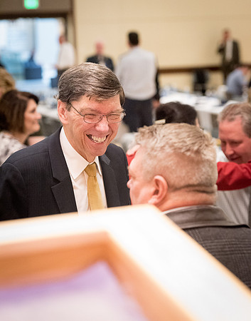 Faculty enjoy a luncheon with Clayton Christensen, the Kim B. Clark Professor of Business Administration at the Harvard Business School