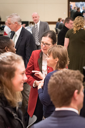 Faculty enjoy a luncheon with Clayton Christensen, the Kim B. Clark Professor of Business Administration at the Harvard Business School