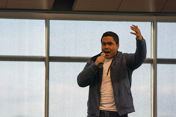 A contestant in The Last Voice Standing performs on the Crossroads stage during the 2014 Spring Semester.