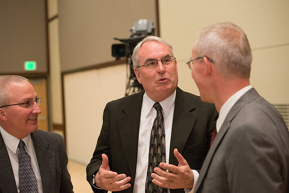Faculty gather at a luncheon to be taught by Clayton Christensen, the "Kim B. Clark Professor" of Business Administration at the Harvard Business School.