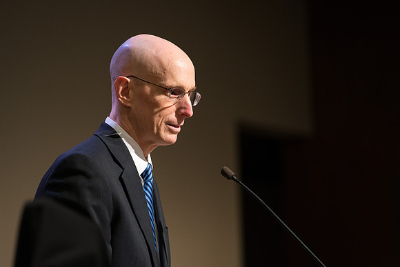 Faculty gather at a luncheon to be taught by Clayton Christensen, the "Kim B. Clark Professor" of Business Administration at the Harvard Business School.