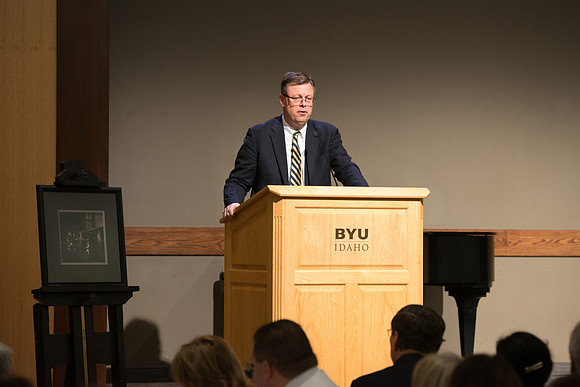 Faculty gather at a luncheon to be taught by Clayton Christensen, the "Kim B. Clark Professor" of Business Administration at the Harvard Business School.