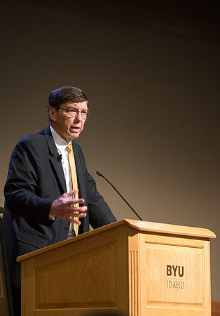 Faculty gather at a luncheon to be taught by Clayton Christensen, the "Kim B. Clark Professor" of Business Administration at the Harvard Business School.