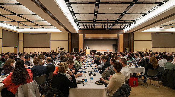 Faculty gather at a luncheon to be taught by Clayton Christensen, the "Kim B. Clark Professor" of Business Administration at the Harvard Business School.