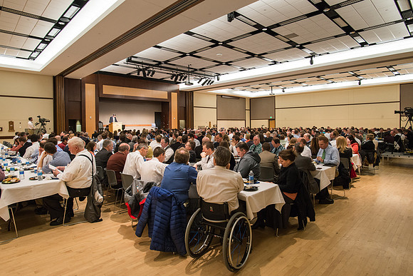 Faculty gather at a luncheon to be taught by Clayton Christensen, the "Kim B. Clark Professor" of Business Administration at the Harvard Business School.