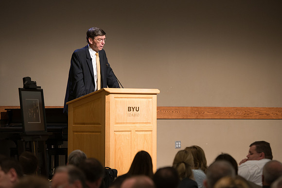 Faculty gather at a luncheon to be taught by Clayton Christensen, the "Kim B. Clark Professor" of Business Administration at the Harvard Business School.