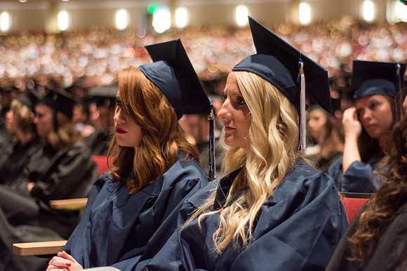 BYU-Idaho Graduates listen to the opening remarks at the commencement ceremony. Photo by Ryan Chase