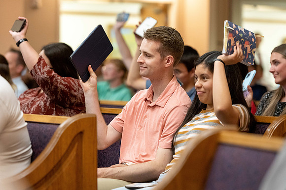Students participating at devotional.