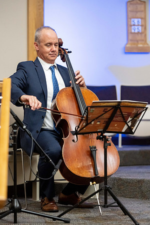 A cellist and pianist perform during devotional.